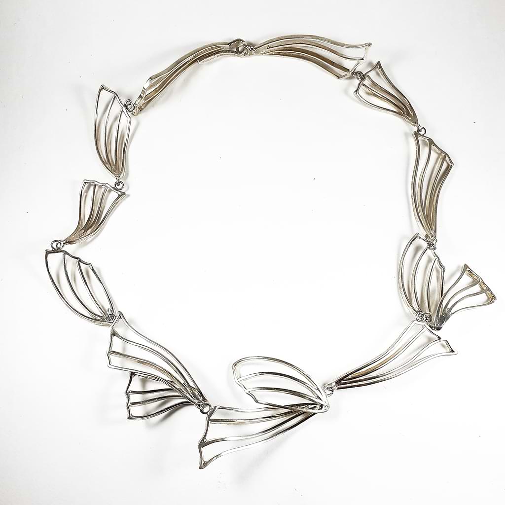 Niki Boli. Silver necklace with wavy elements