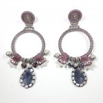 Ayala Bar-Large earrings in violet shades.