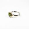 Mary Margoni. Ring with Peridote tied with yellow gold.