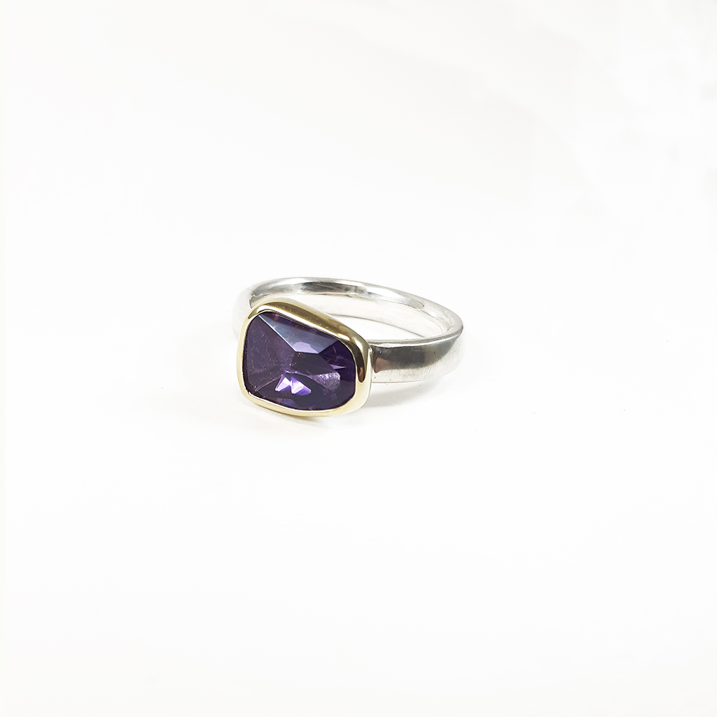 Mary Margoni. Irregular rectangular ring with Amethyst tied with gold