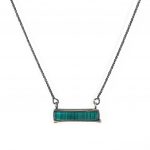 Niki Boli. Horizontal rectangular doublet pendant with malachite and crystal and gold element. side view