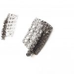 Iosif.Silver rectangular earrings with perforation and synthetic stones. Detail