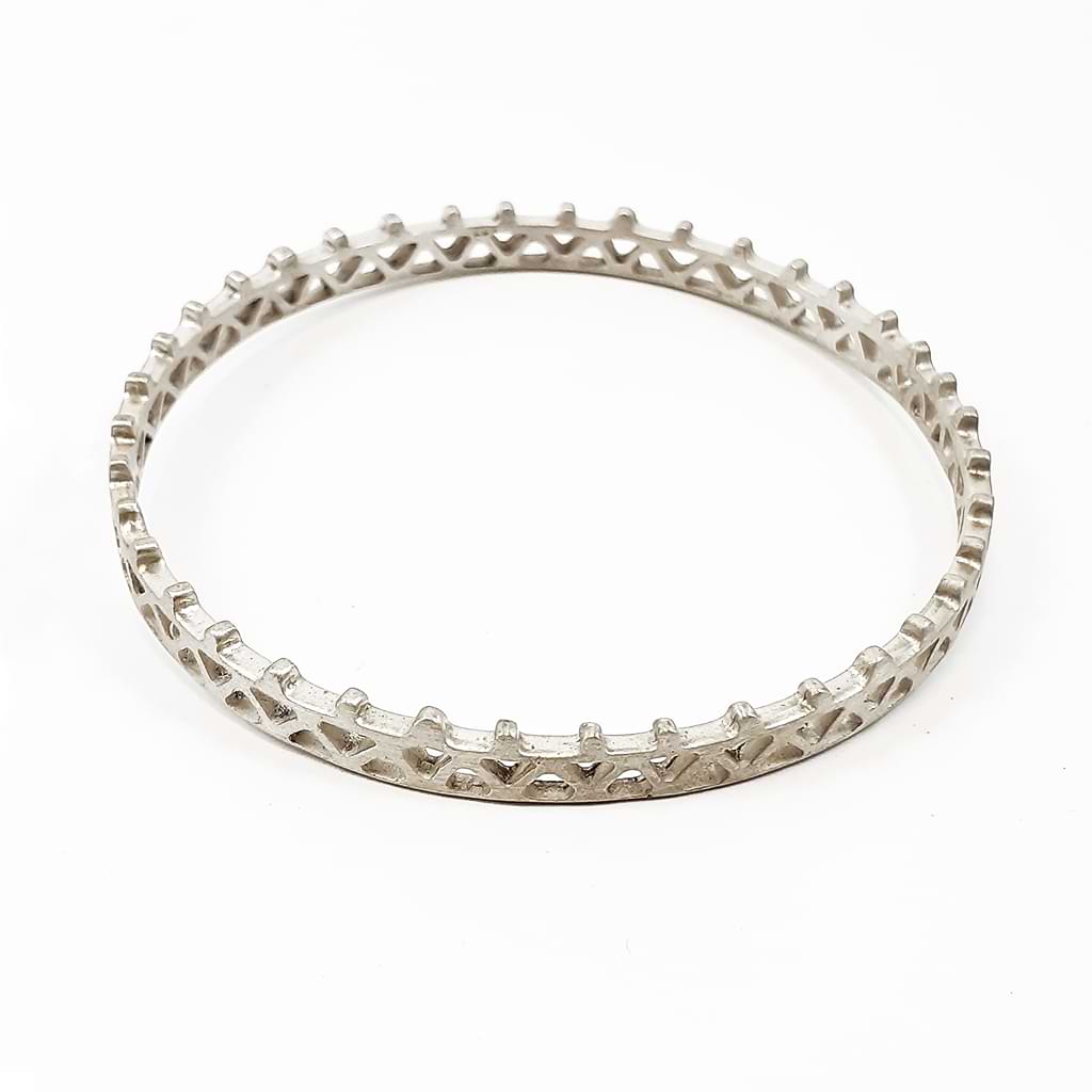 Katerina Malami. Silver bracelet with geometric patterns.