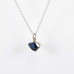 Mary Margoni. Elegant pendant with polygonal London Blue Topaz tied with 18ct gold & silver. Front View