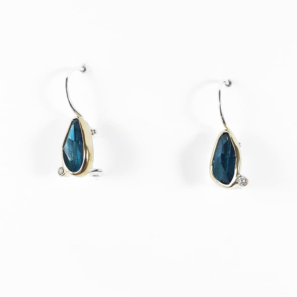 Mary Margoni. Elegant dangling earrings with London Blue Topaz and 0.04ct diamond tied with 18ct gold.