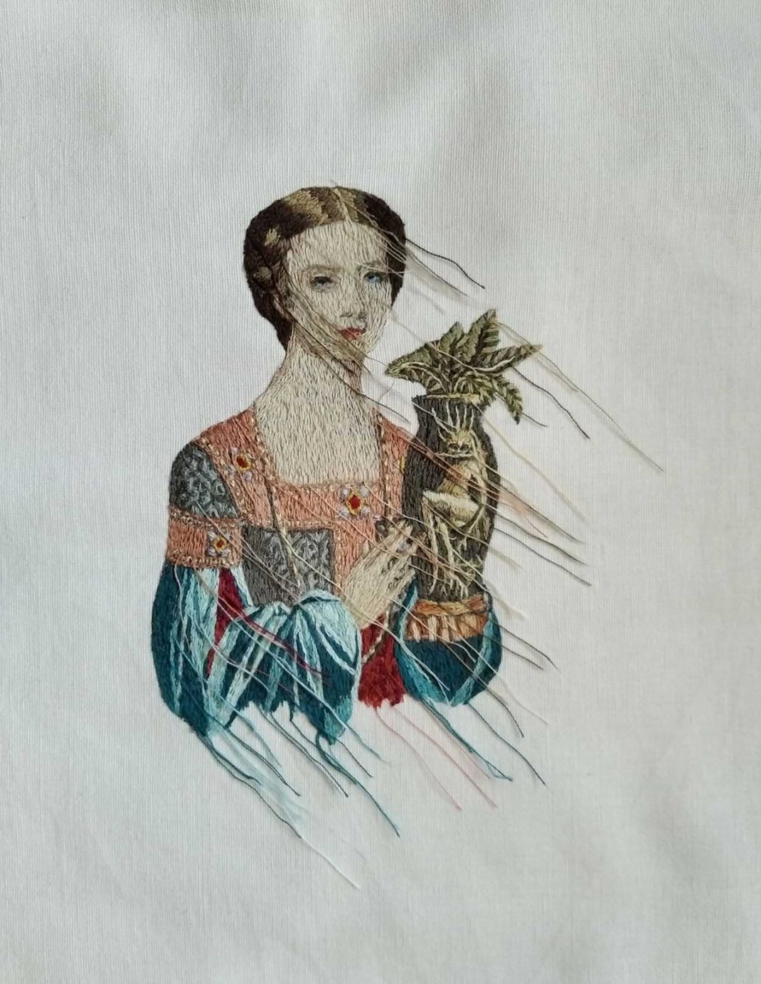 Iphigeneia Sdoukou. Embroidery by hand. Woman holding jar of mandrake