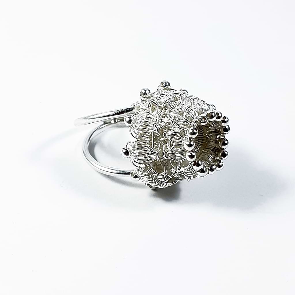 Myrsini Bezourgianni. Silver wire ring with maltesing technique, braided by hand. Side view