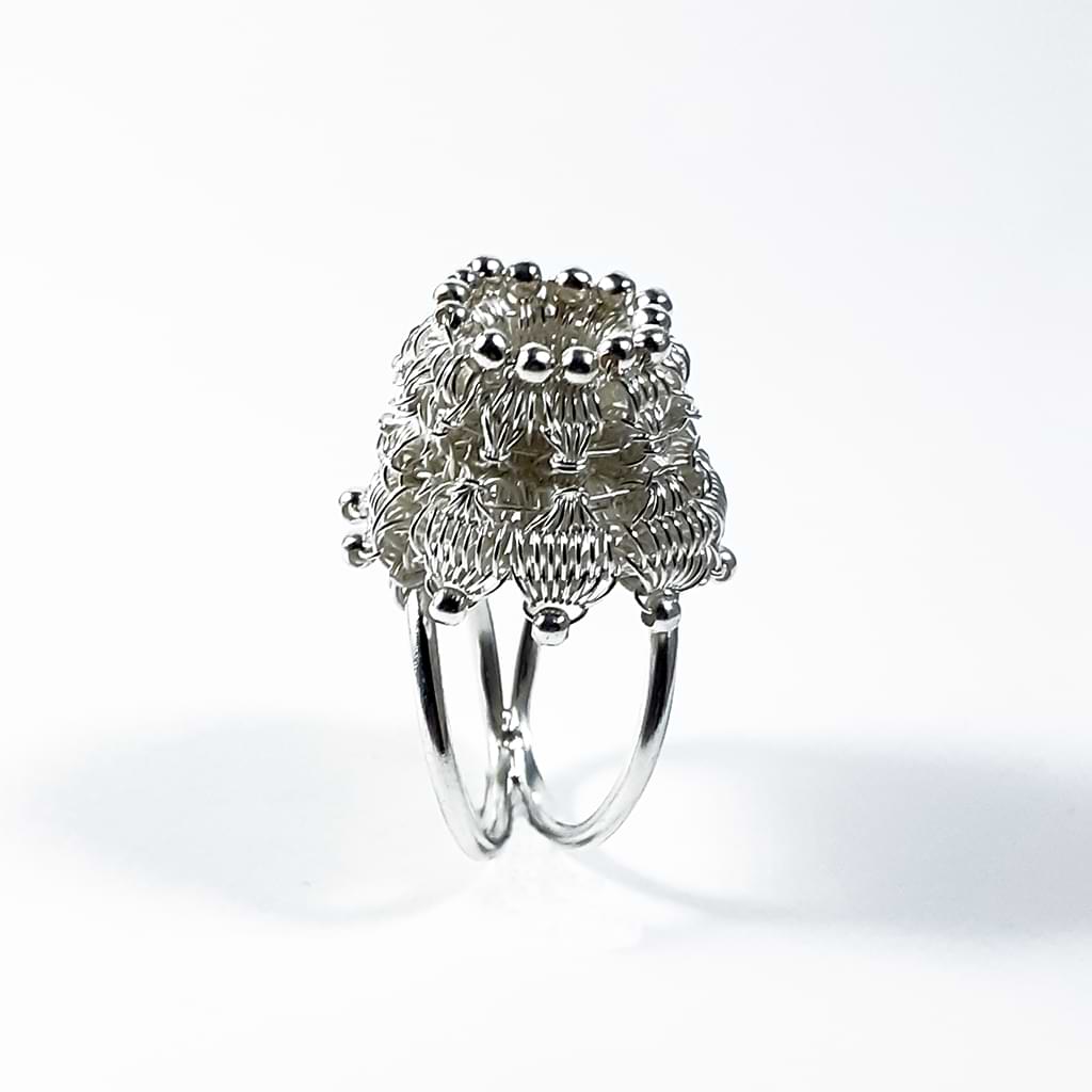 Myrsini Bezourgianni. Silver wire ring with maltesing technique, braided by hand.